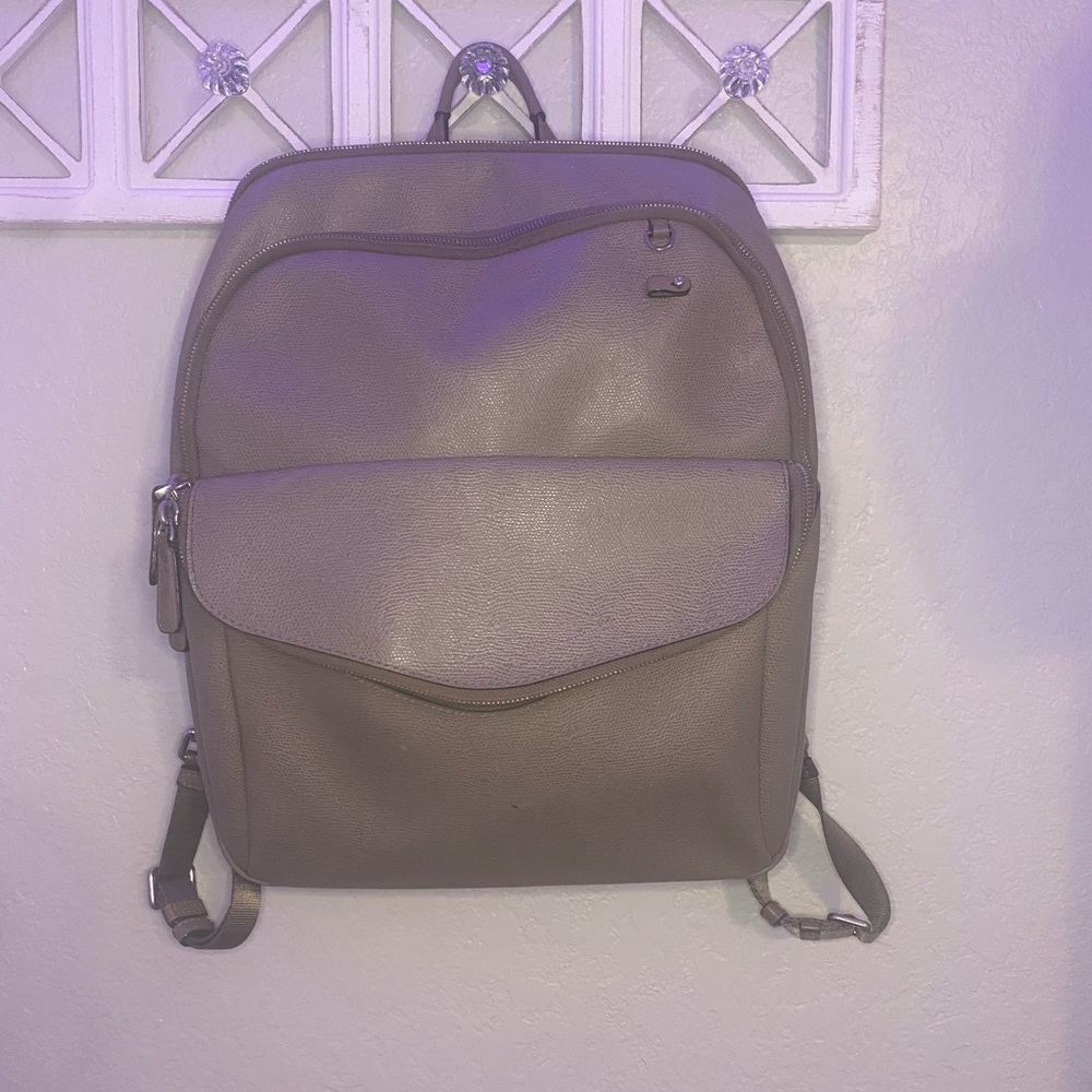 Medium Tumi backpack Grey.
